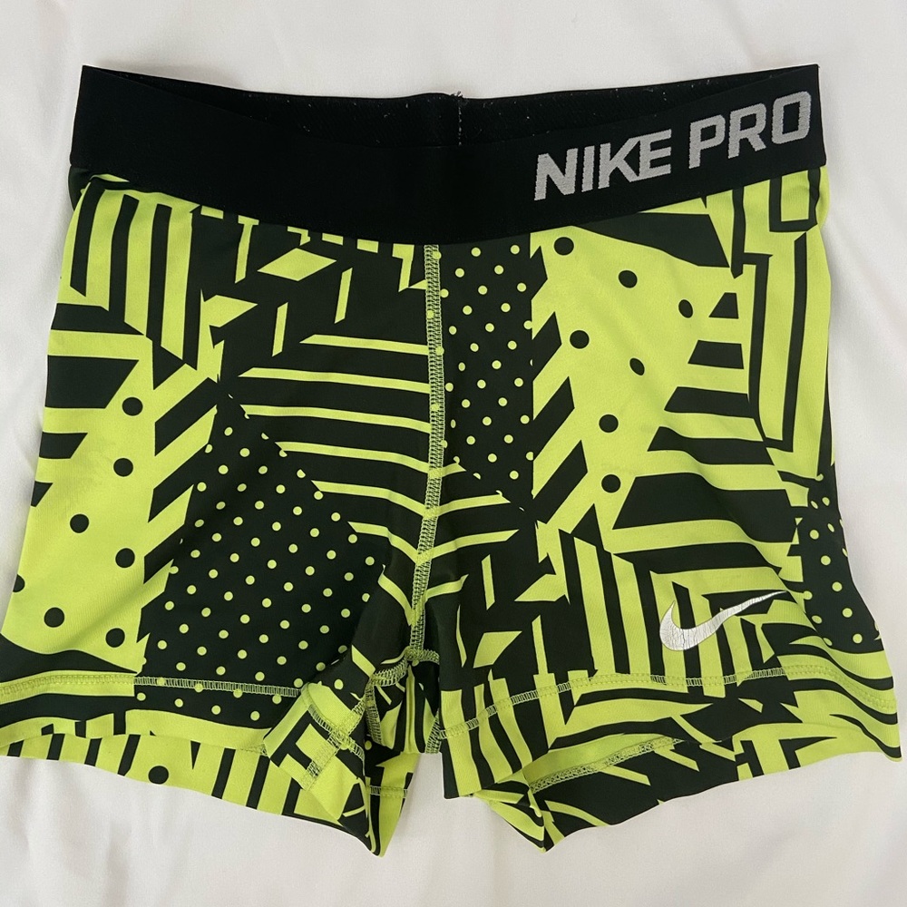 Black/neon Nike pros